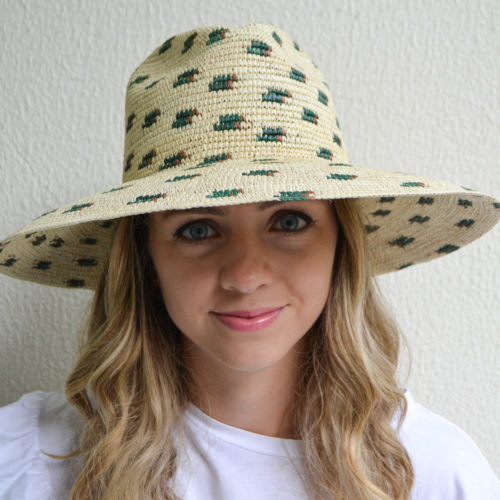 Wide brim hat with green and brown details