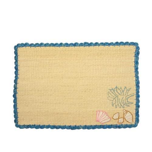 Straw placemat with handwoven seashells