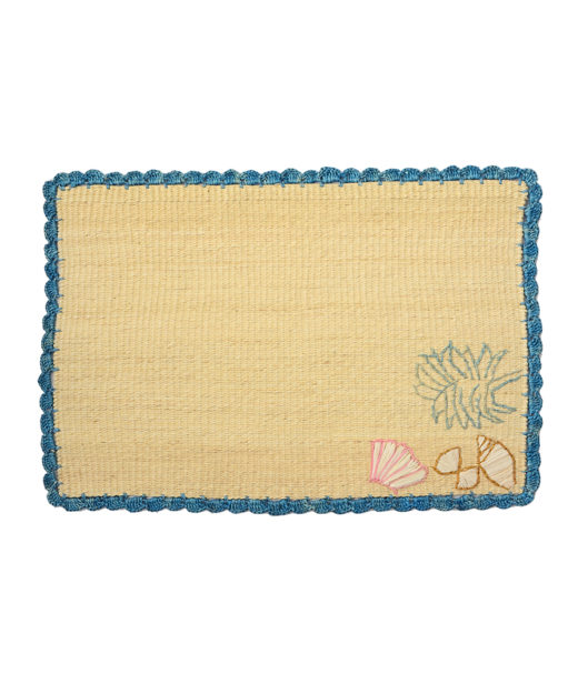 Straw placemat with handwoven seashells