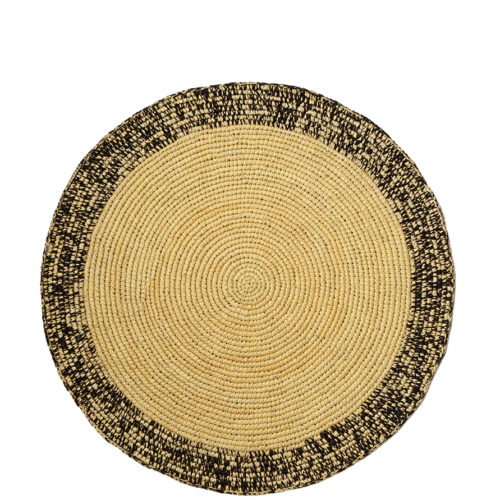 Straw placemat with black speckles