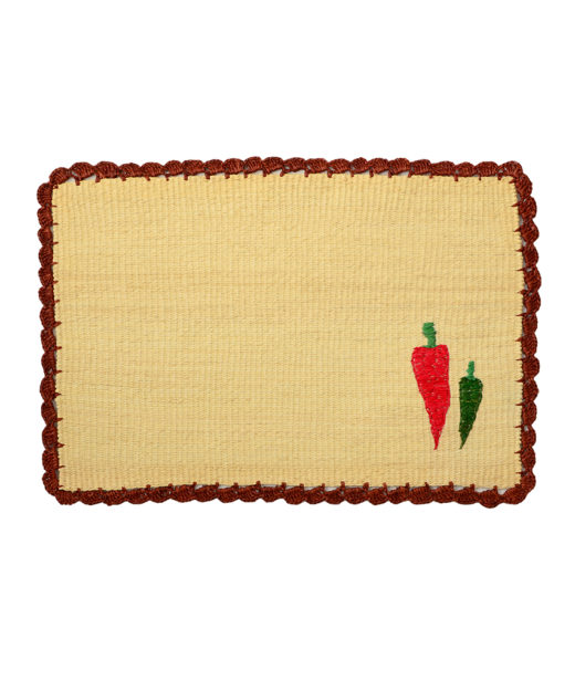 Straw placemat with handwoven chili peppers
